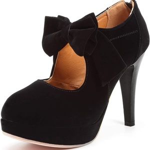 Adorable black platform heels with cute bow detail.